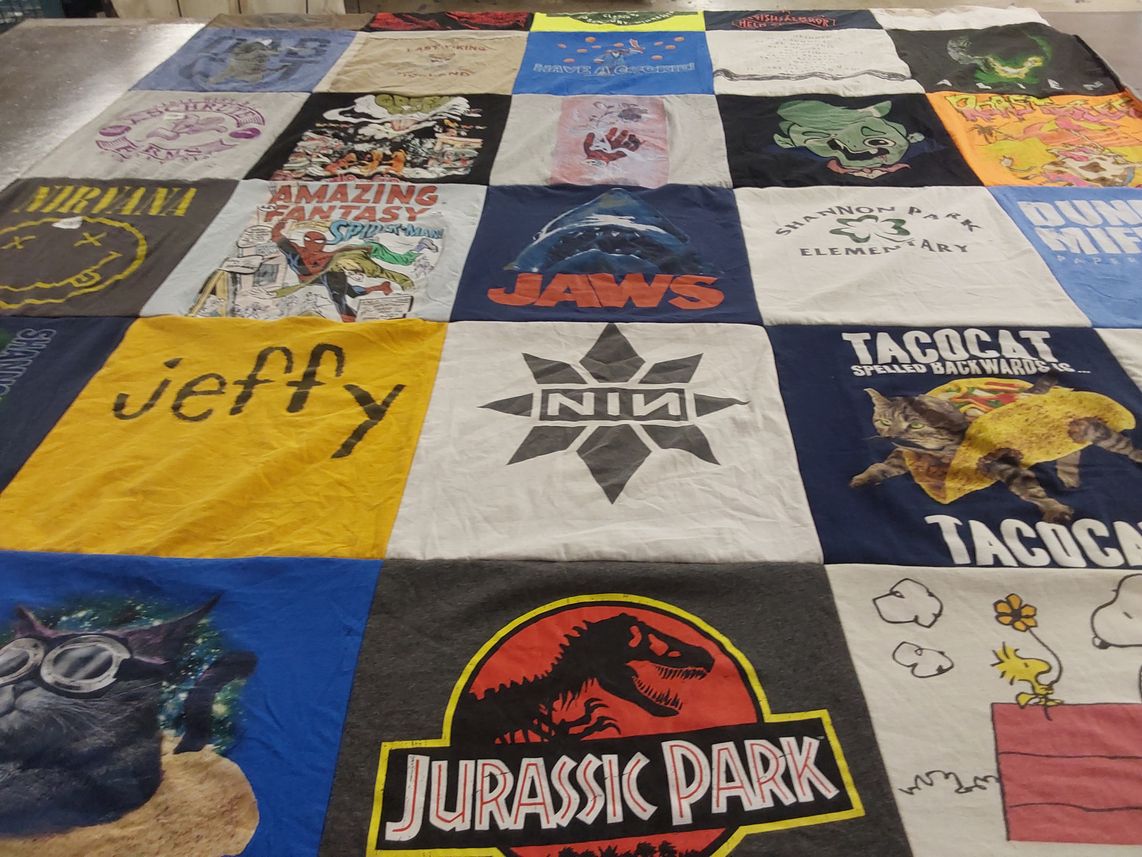 T-shirt quilt with comics, movies themes by Kari from MN
