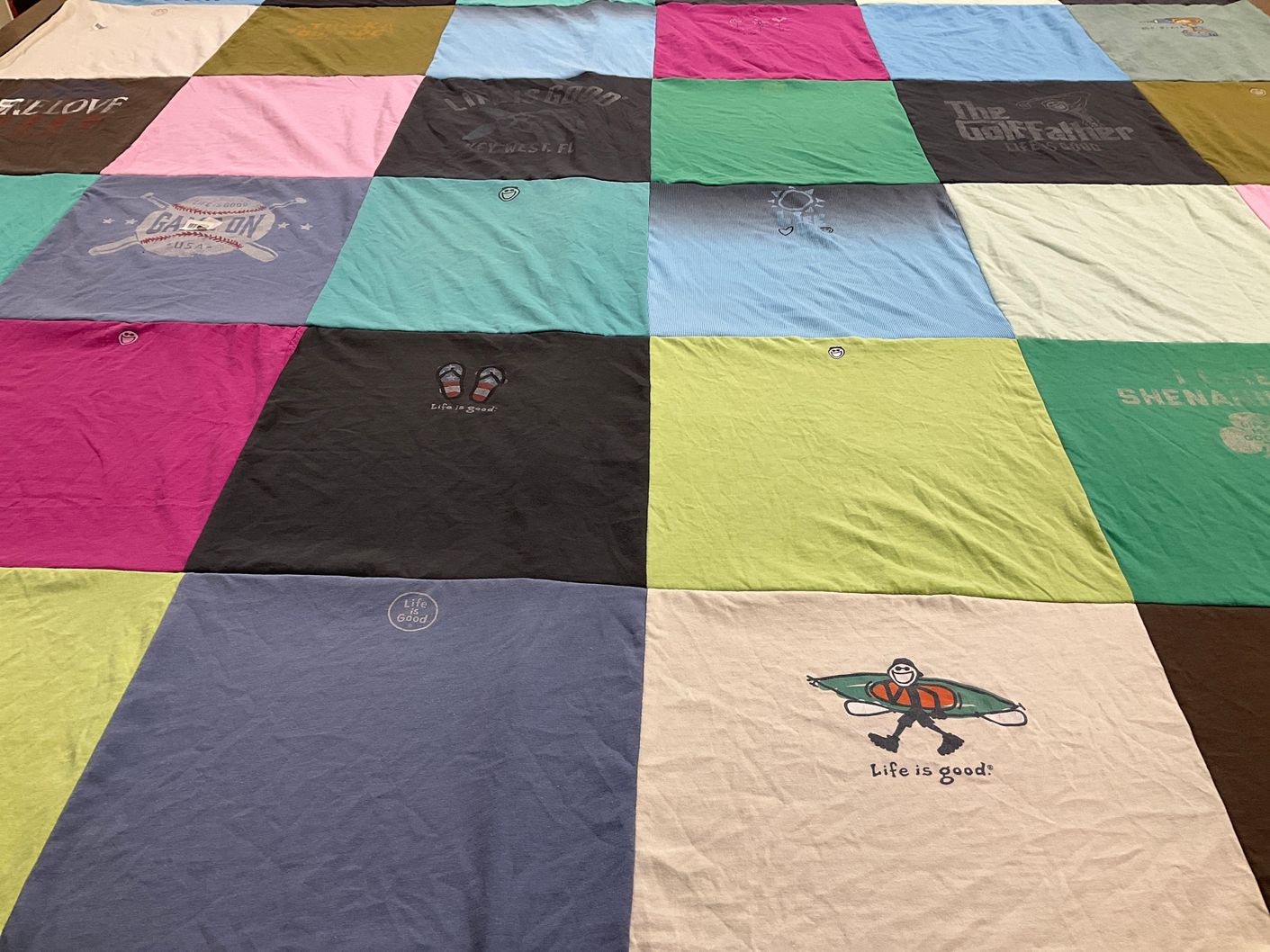 T-shirt quilt with outdoor, travel themes by Lynne from SC