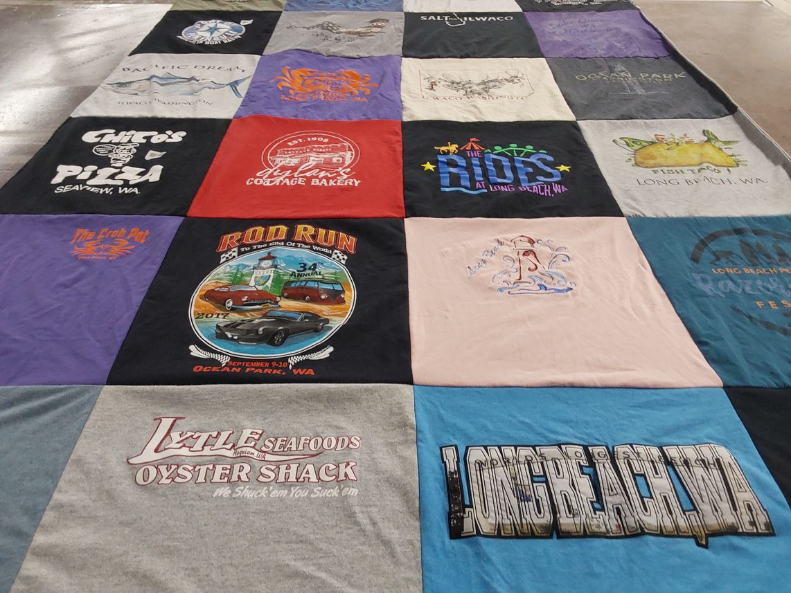 T-shirt quilt with food, community events themes by Robert from ID