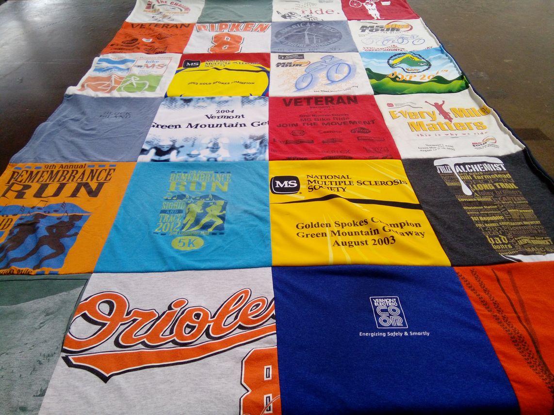T-shirt quilt with sports, charity themes by Robert from VT