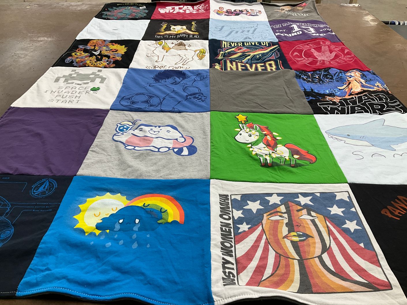 T-shirt quilt with gaming, movies themes by Roberta from IA