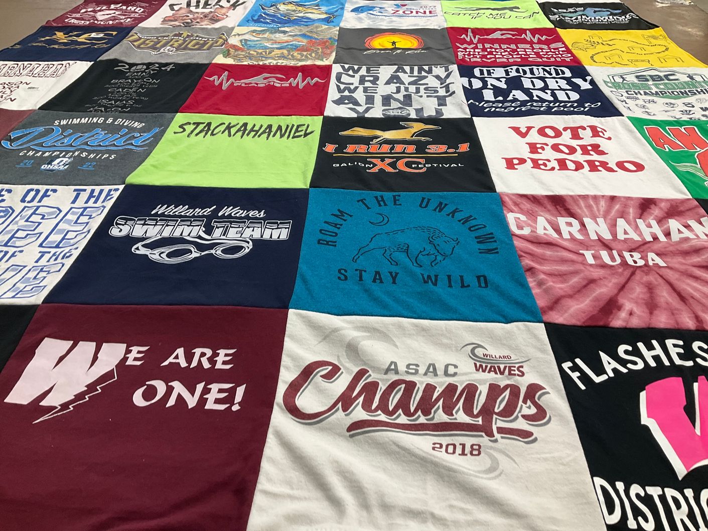 T-shirt quilt featuring willard waves swim team by Courtney from OH