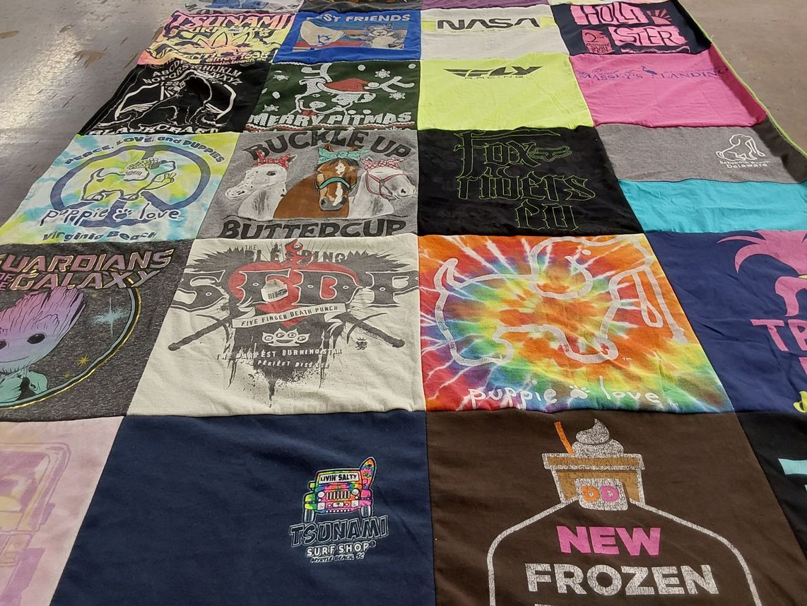 T-shirt quilt with surfing, pets themes by Carrie from PA