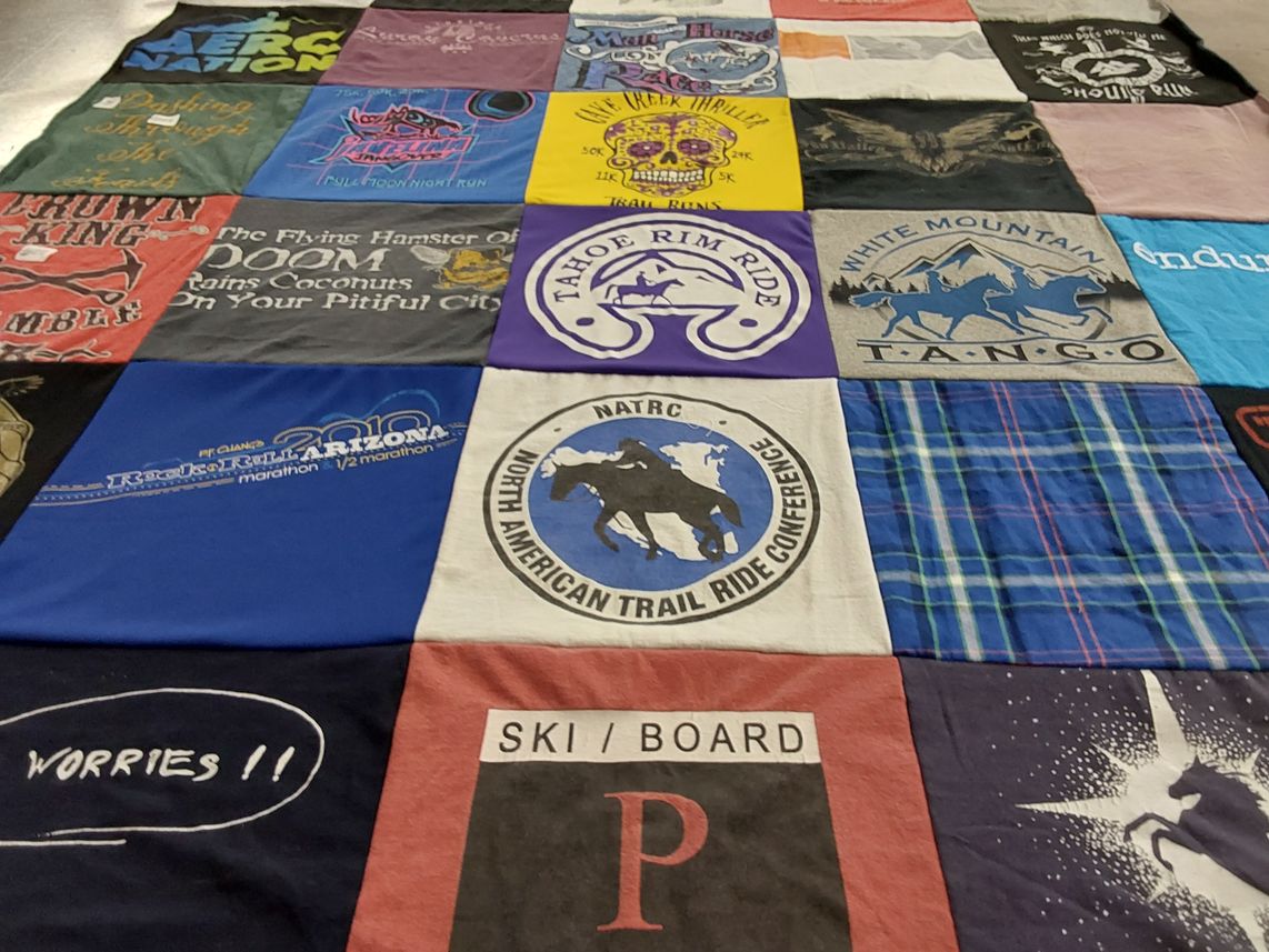 T-shirt quilt with running, outdoor activities themes by Ashley from AZ