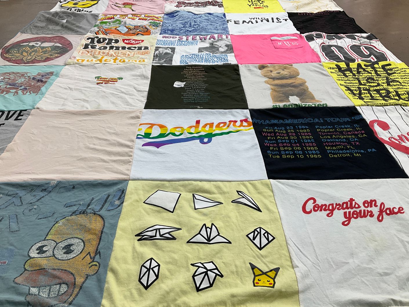 T-shirt quilt with music, sports themes by Hana from CA