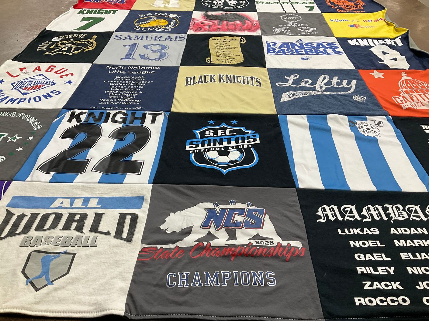 T-shirt quilt featuring s.e.f. santos football club, black knights by Joanna from CA