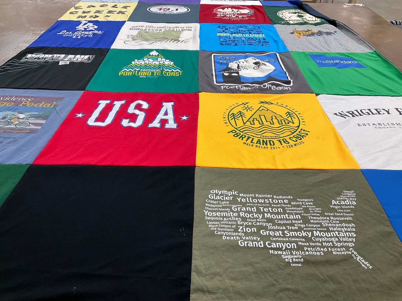 T-shirt quilt with outdoor activities, hiking themes by Debi from VA