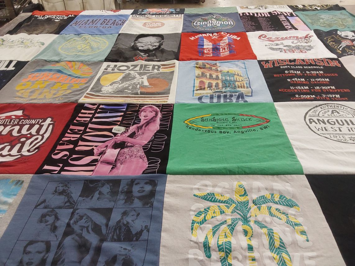 T-shirt quilt with music, travel themes by Valerie from OH