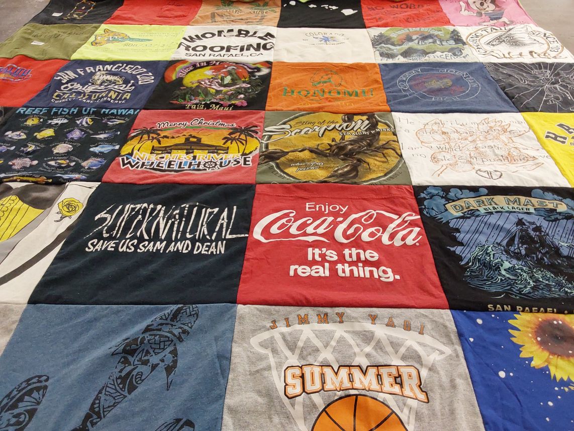 T-shirt quilt with tv shows, beverages themes by Jenna Rose from CA