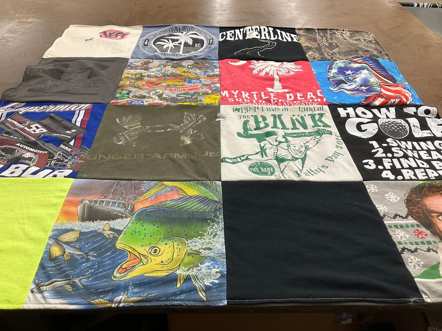 T-shirt quilt with fishing, golf themes by Tosha from MO