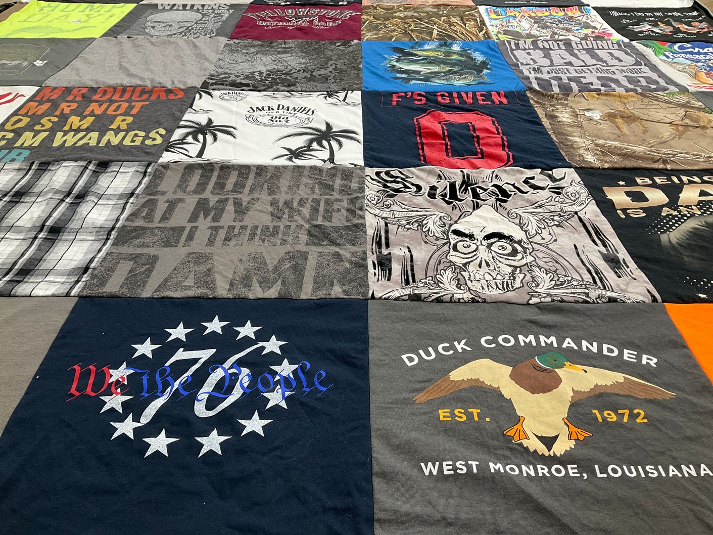 T-shirt quilt with hunting, fishing themes by Tosha from MO