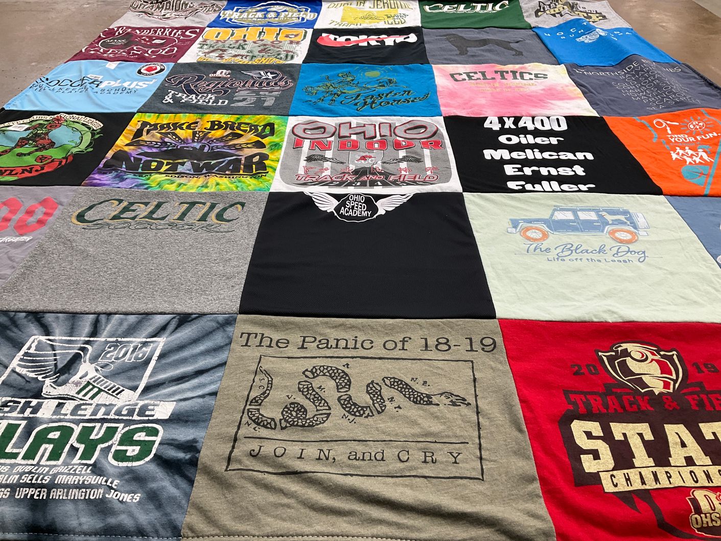 T-shirt quilt featuring olear track and field by Sam from OH