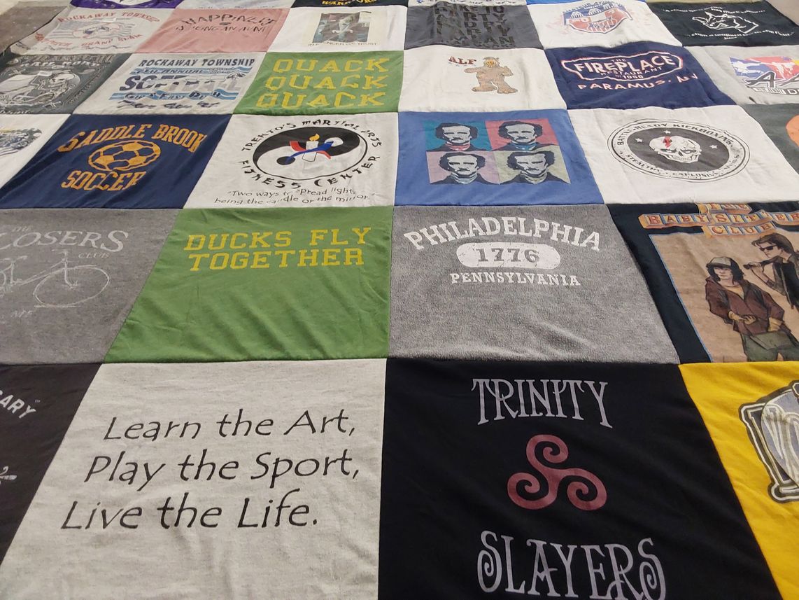 T-shirt quilt with sports, art themes by Jessica from NJ