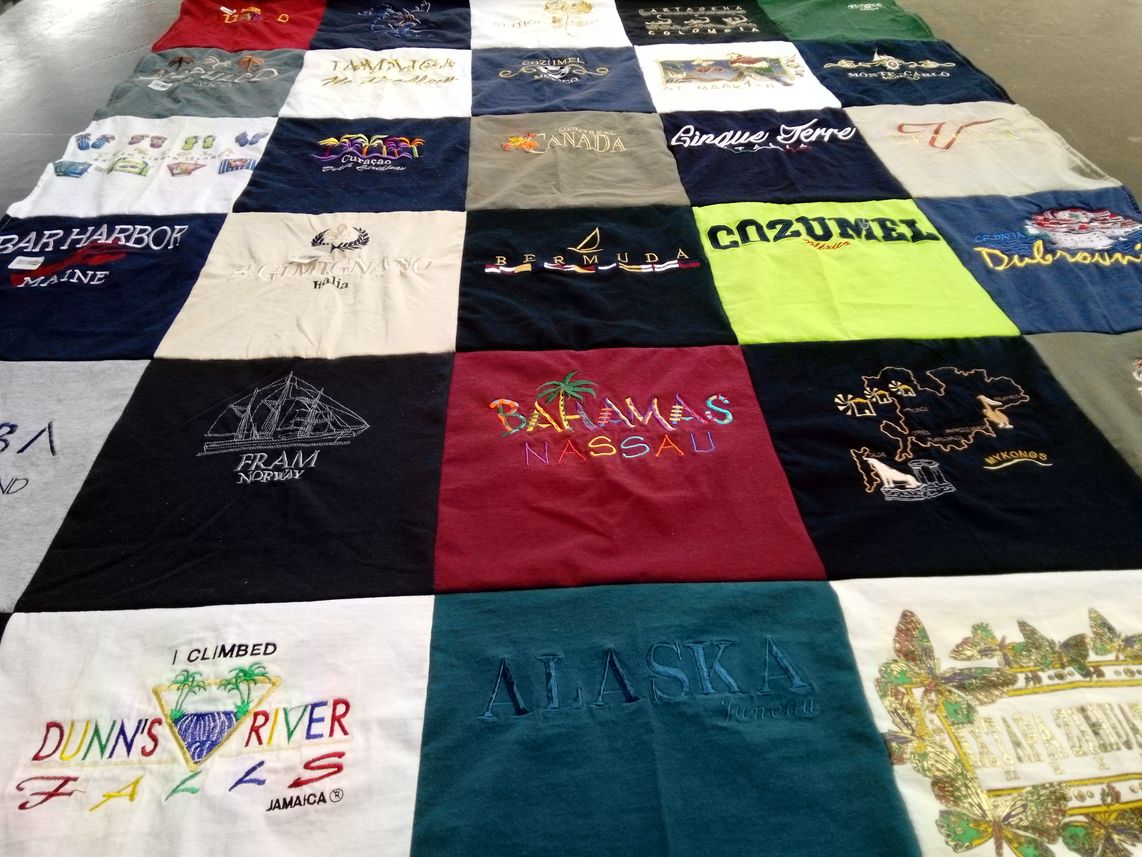 T-shirt quilt with travel, exploration themes by Denise from PA