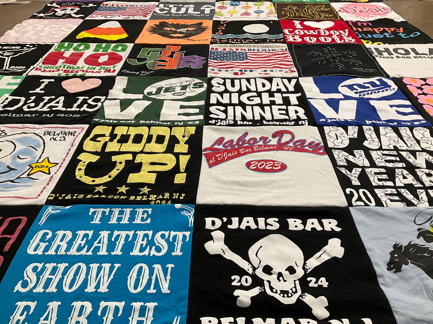 T-shirt quilt with local culture, community events themes by Debbie from NJ