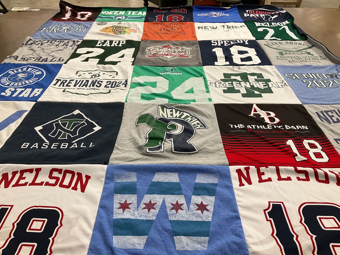T-shirt quilt from new trier high school, trevians high school by Jennifer from IL