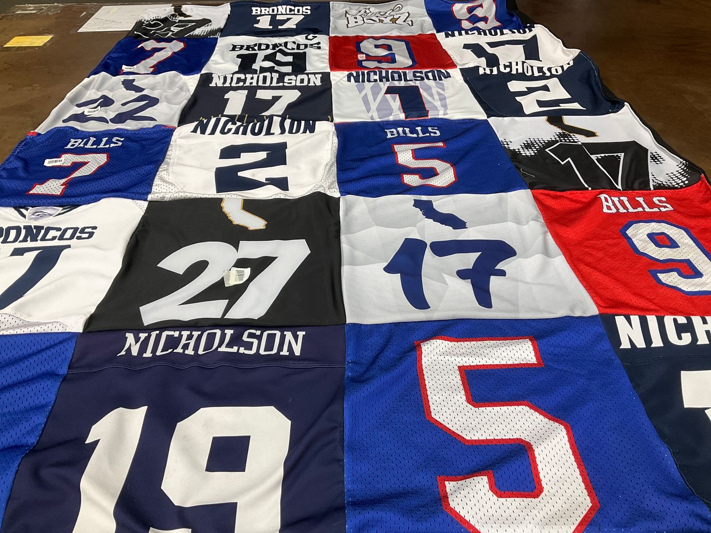 T-shirt quilt with football themes by Alexis from CA