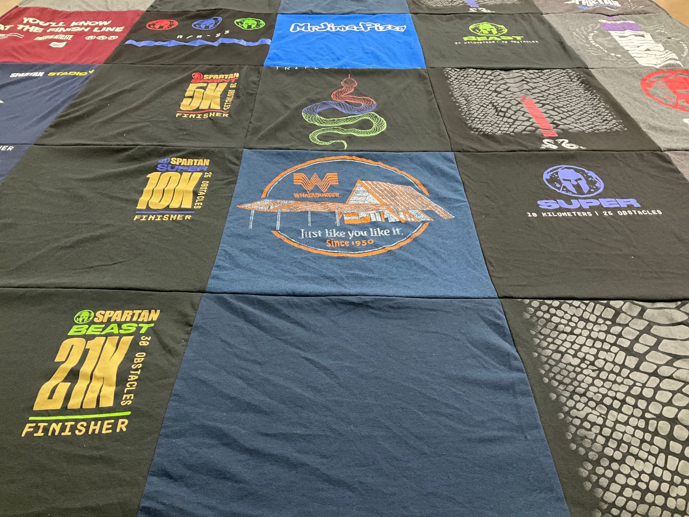 T-shirt quilt with obstacle racing, fitness themes by Amanda from TX