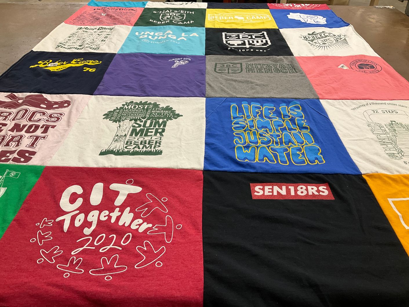 T-shirt quilt with camping, summer activities themes by Leslie from IL