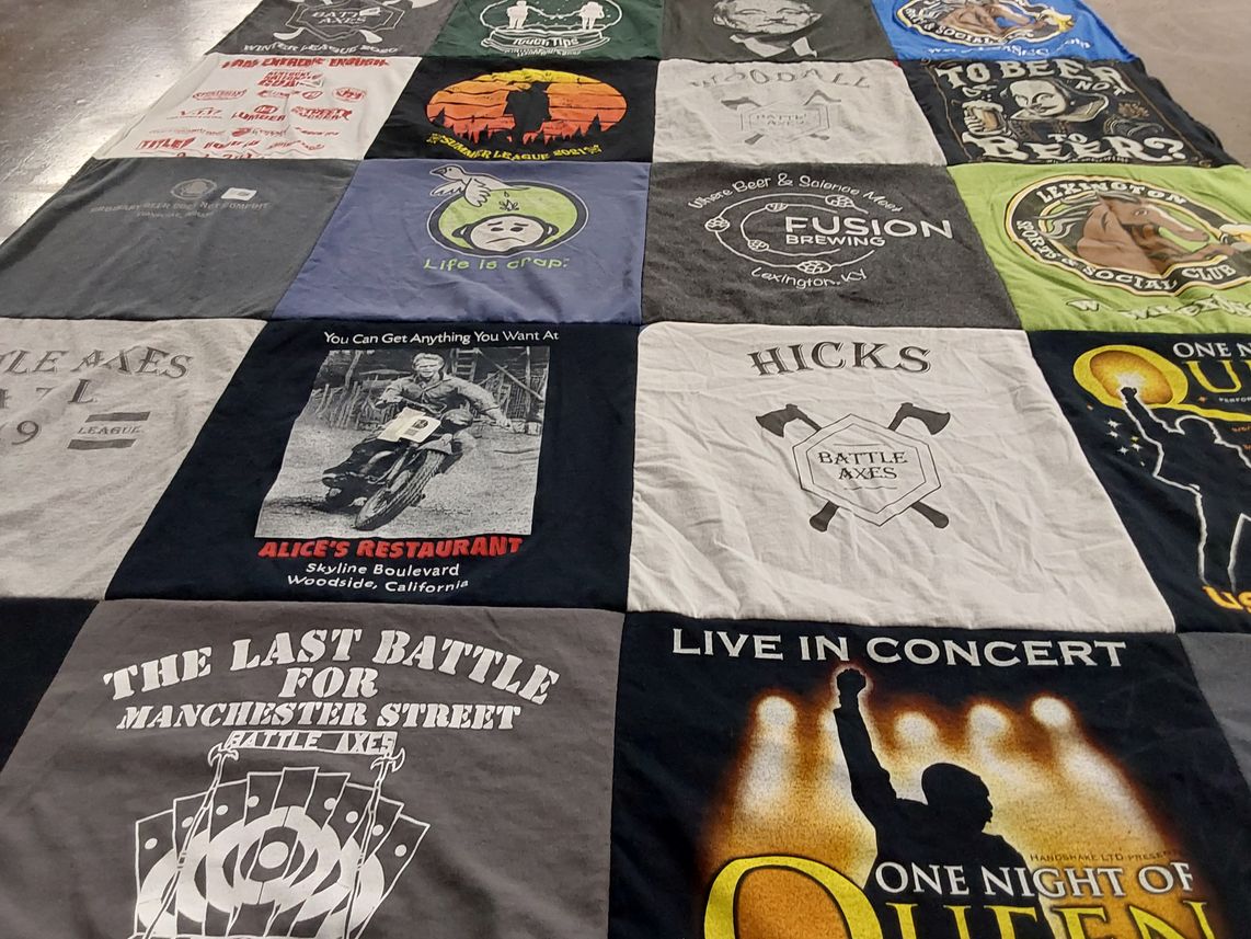 T-shirt quilt with music, dining themes by Erin from KY