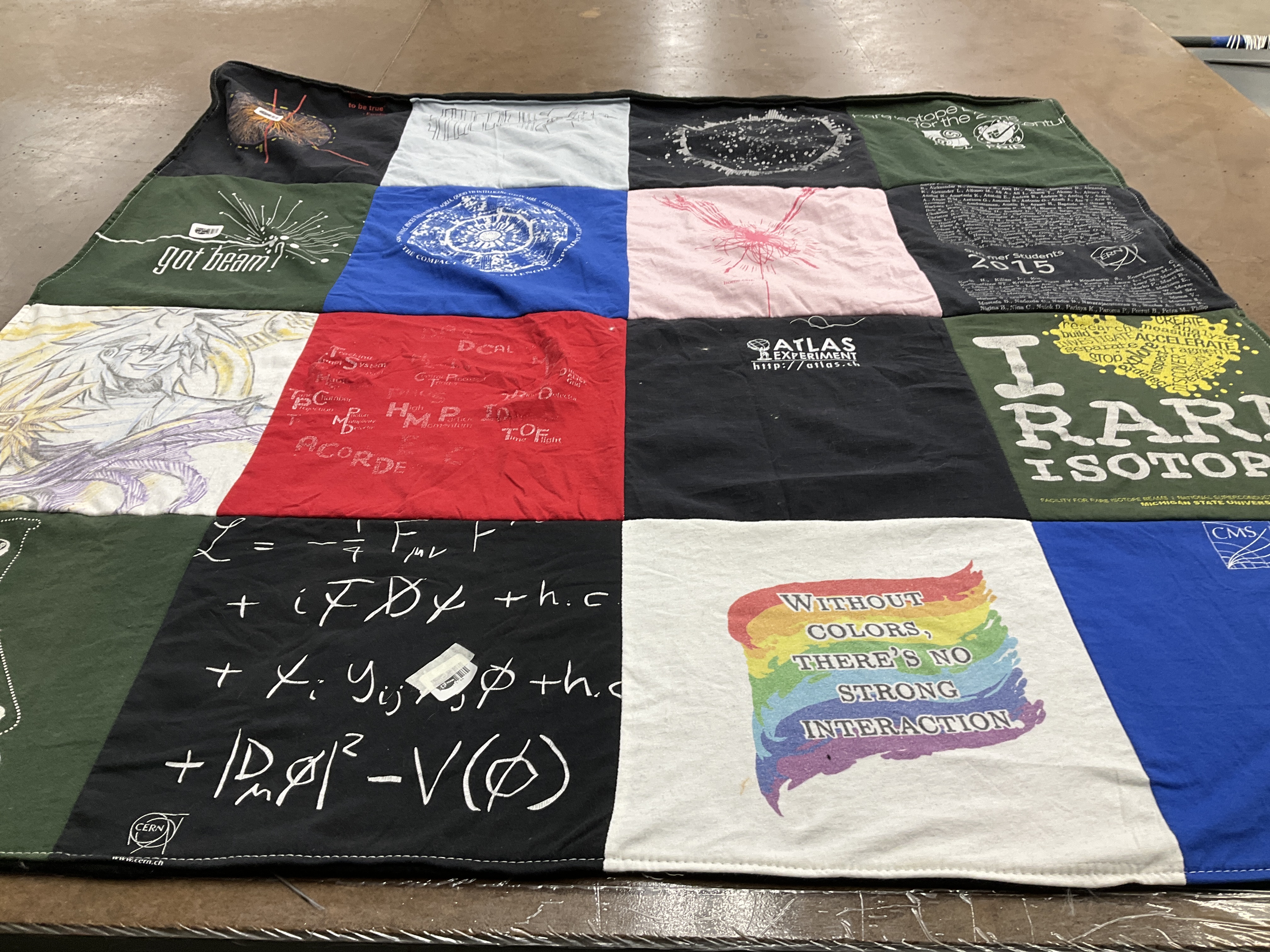 T-shirt quilt with physics, science themes by Wendy from MI