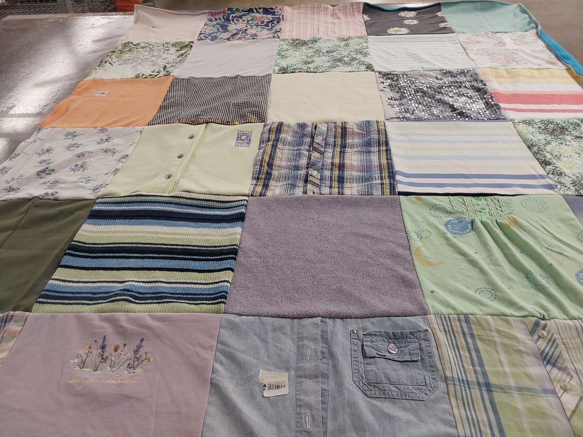T-shirt quilt with quilting themes by Staci from WA