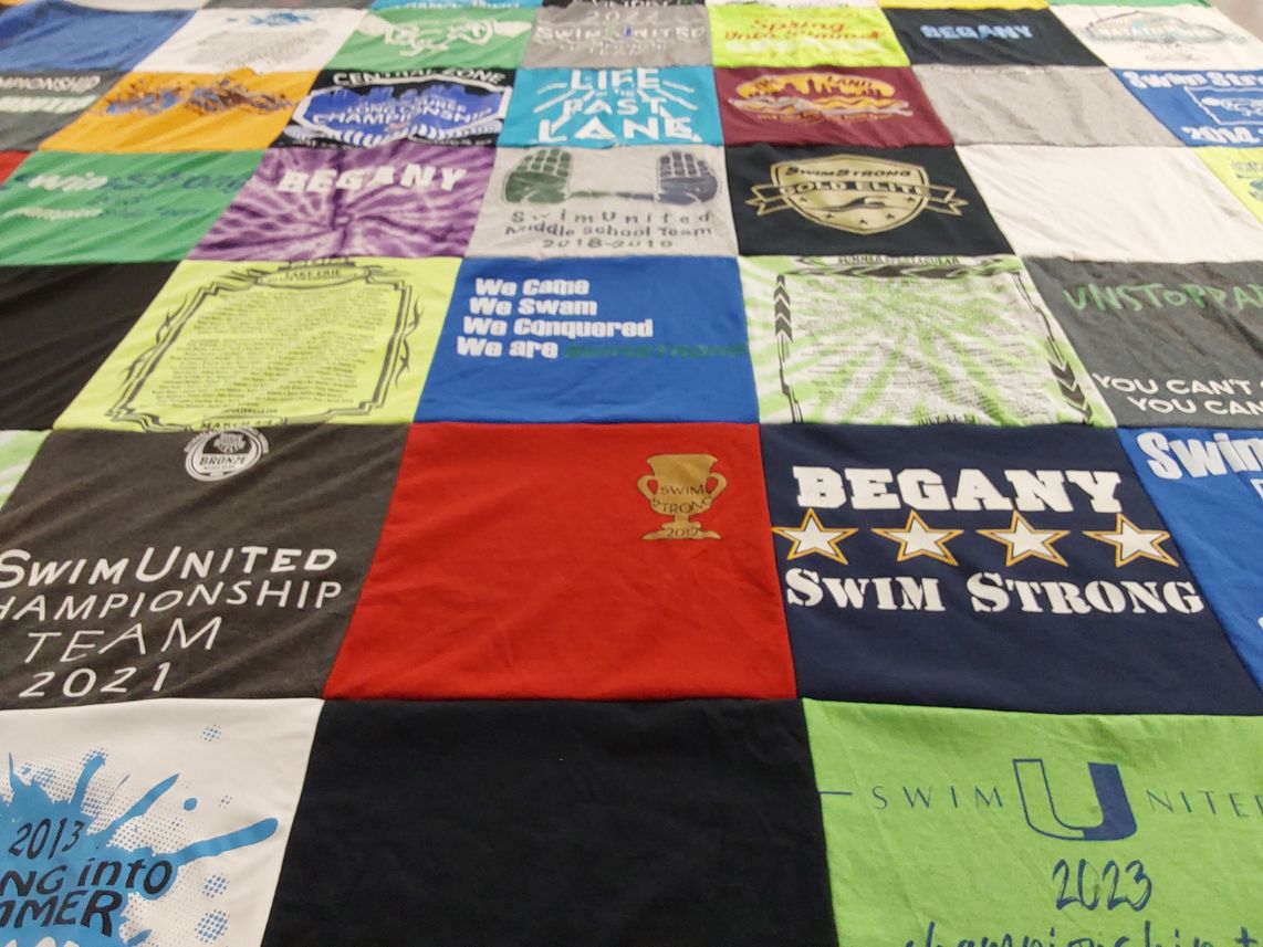 T-shirt quilt featuring swim united championship team by Kim from OH