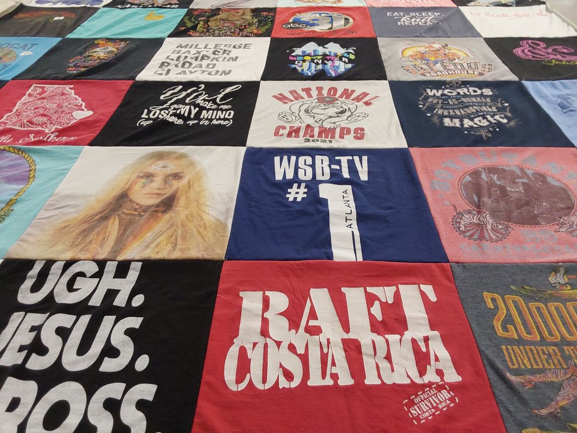 T-shirt quilt with travel, media themes by Savannah from GA