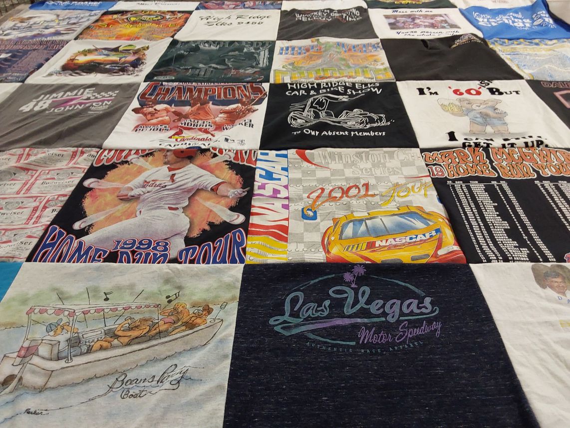 T-shirt quilt with nascar, baseball themes by Darlene from TN
