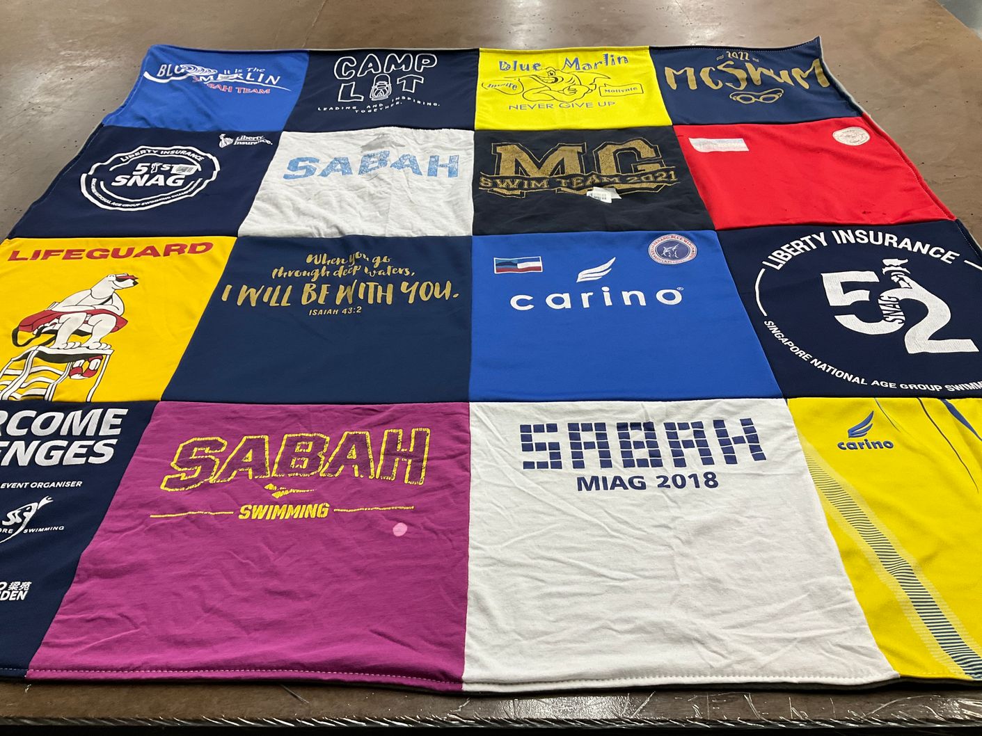 T-shirt quilt featuring sabah swimming by Rena from AZ