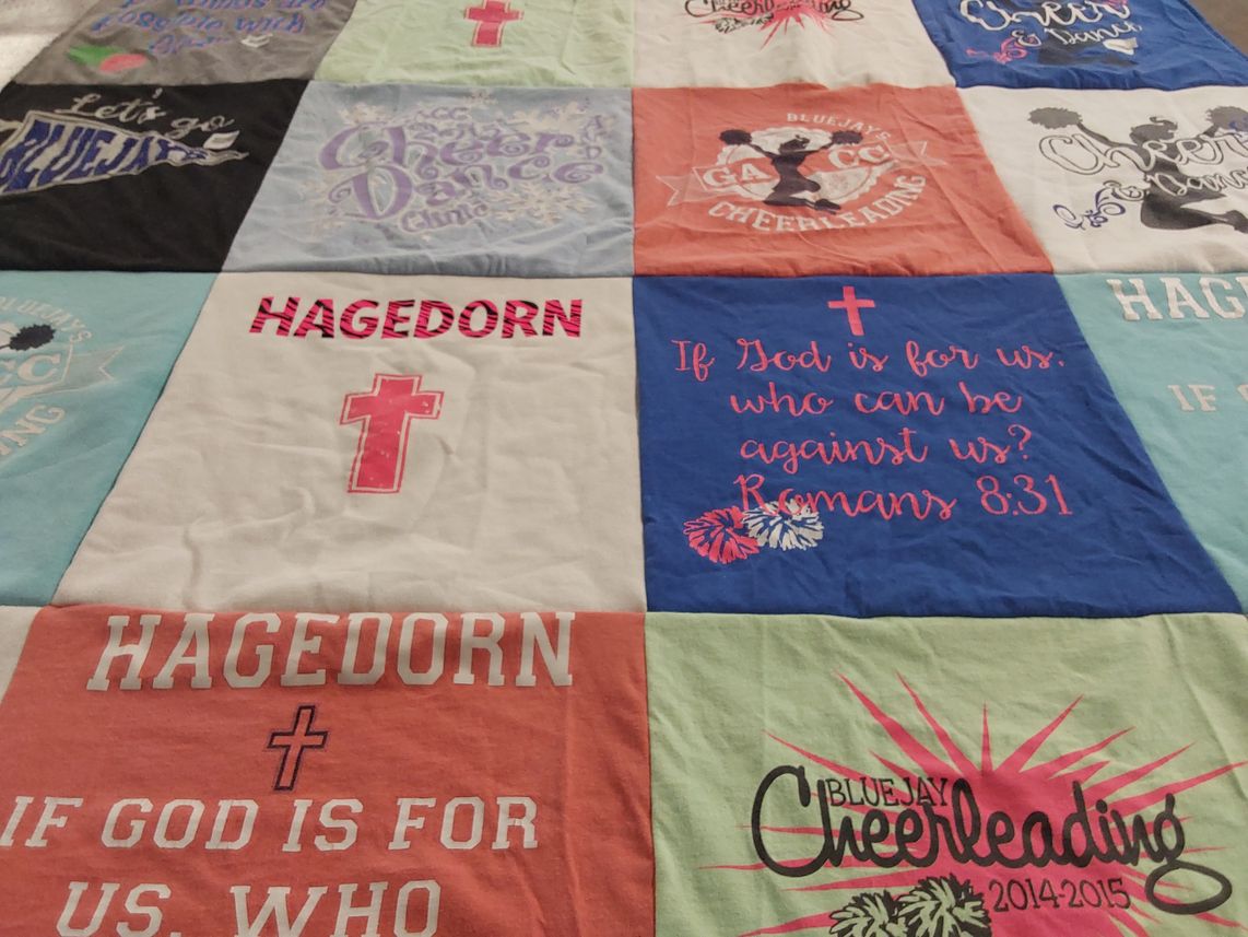 T-shirt quilt featuring bluejay cheerleading by Lana from NE