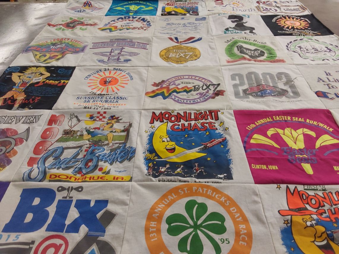 T-shirt quilt with running, sports themes by Darryl from IA