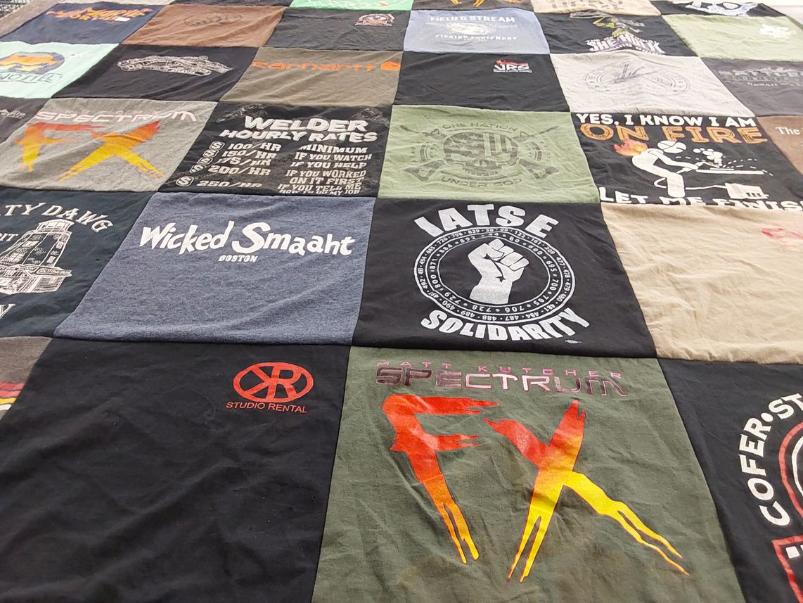 T-shirt quilt with welding, acting themes by Sharon from CA