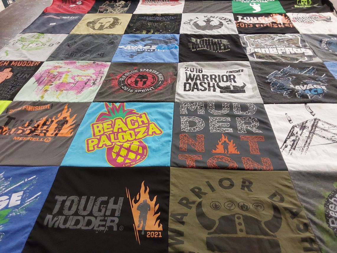 T-shirt quilt with obstacle races, fitness themes by Michelle from TX