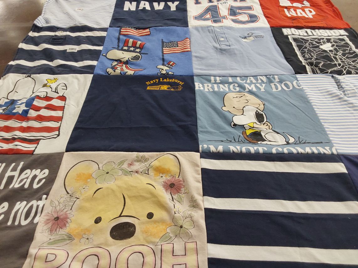 T-shirt quilt with snoopy, winnie the pooh themes by Nancy from GA