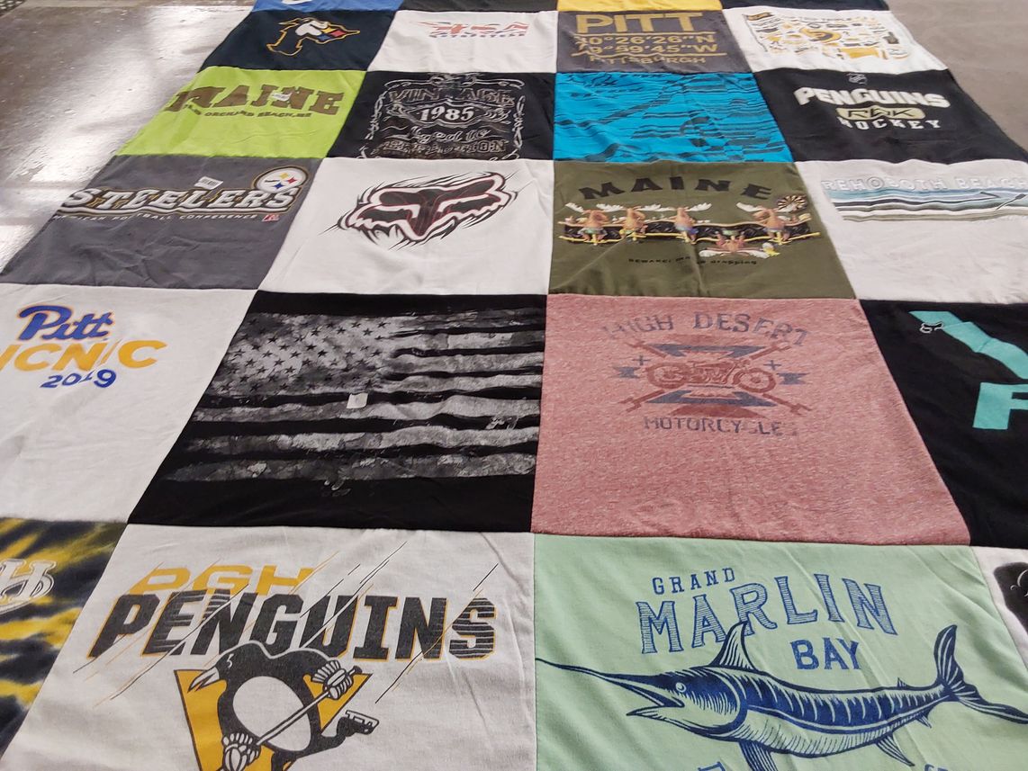 T-shirt quilt featuring pittsburgh penguins, pittsburgh steelers by Heather from PA