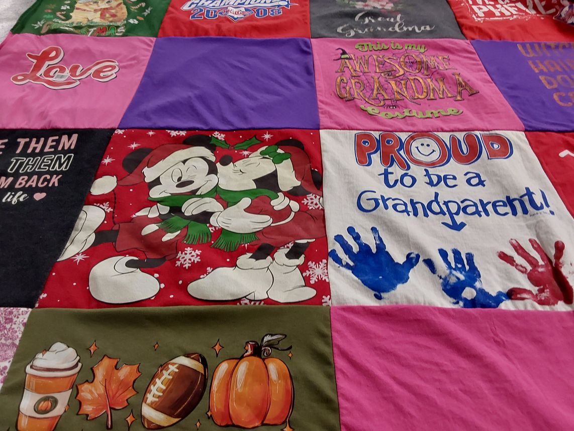 T-shirt quilt with family, holiday themes by Pamela from NJ