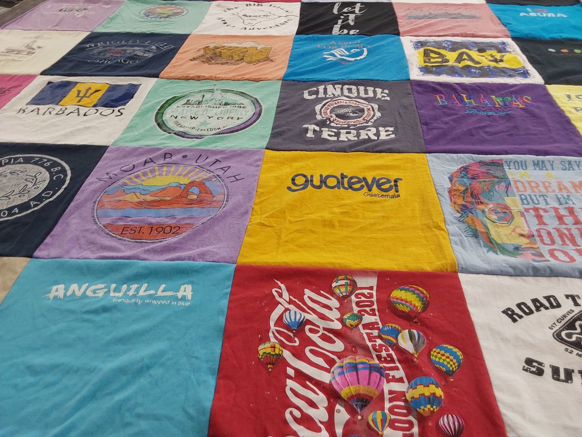 T-shirt quilt with travel, culture themes by Mary from WA