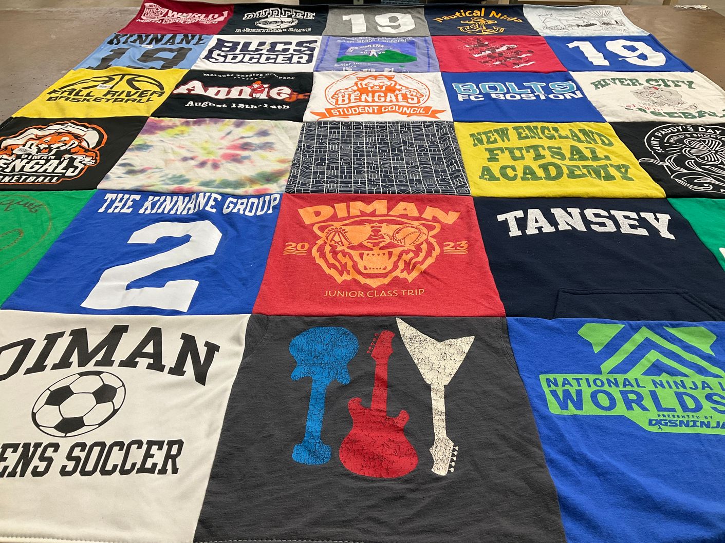 T-shirt quilt featuring dimin regional vocational technical high school boys soccer, dimin regional vocational technical high school basketball by Mary from MA