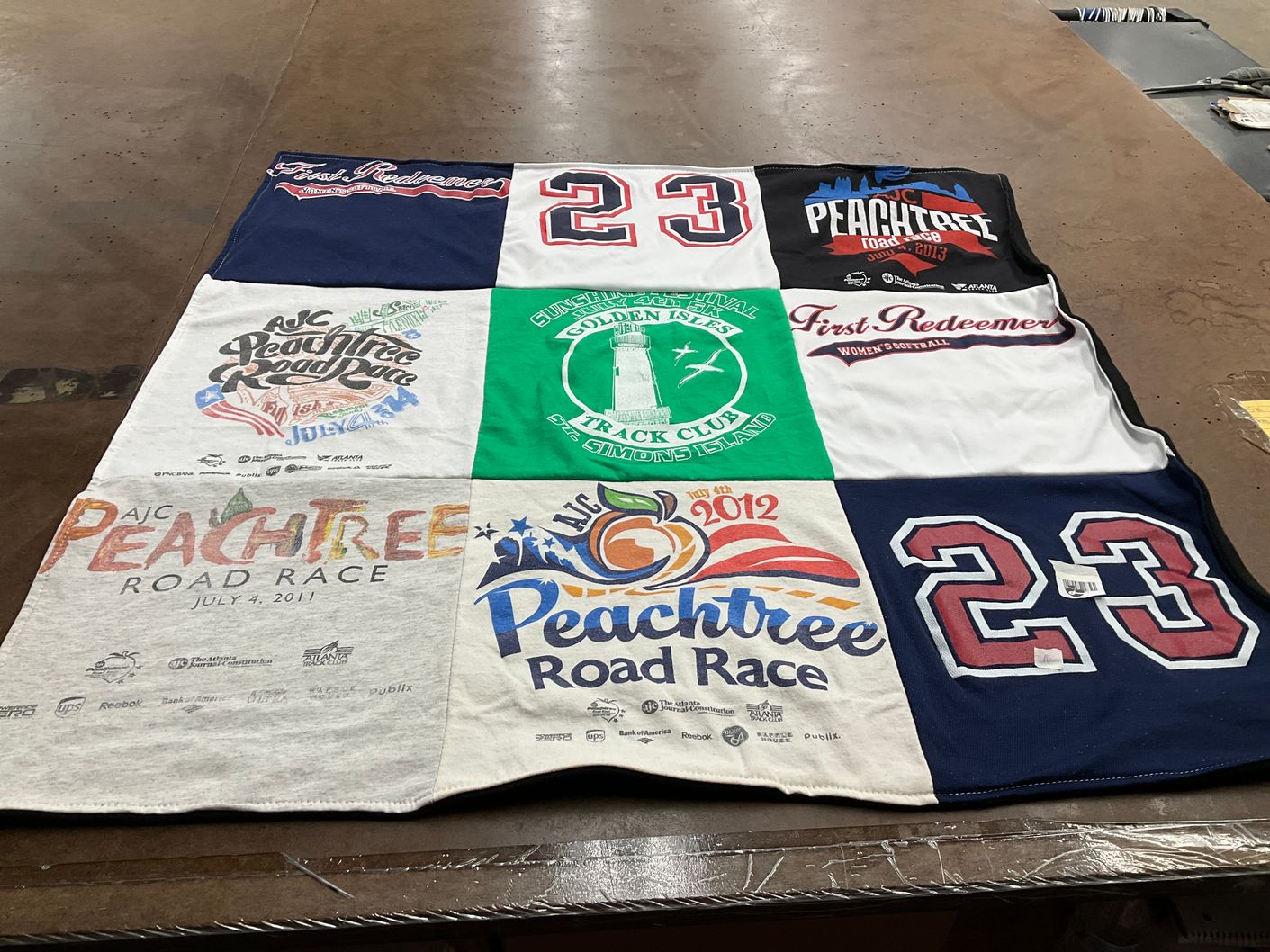 T-shirt quilt with running, track and field themes by john from GA