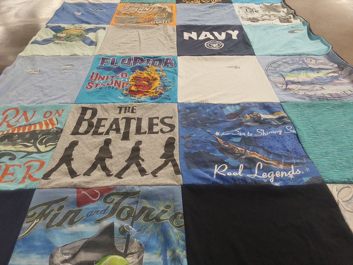T-shirt quilt with music, fishing themes by Kimberly from FL