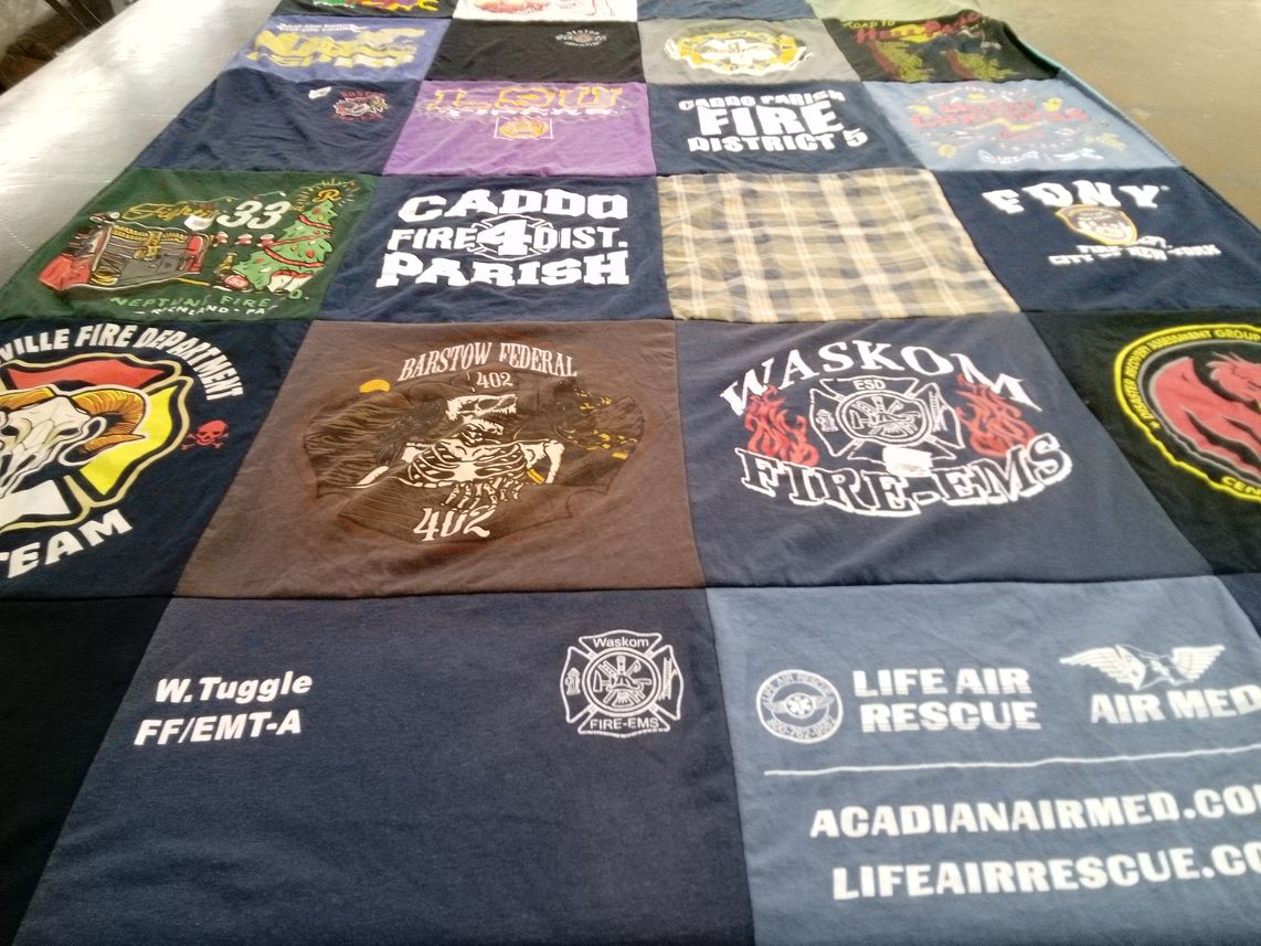 T-shirt quilt with firefighting, emergency services themes by Lesli from LA