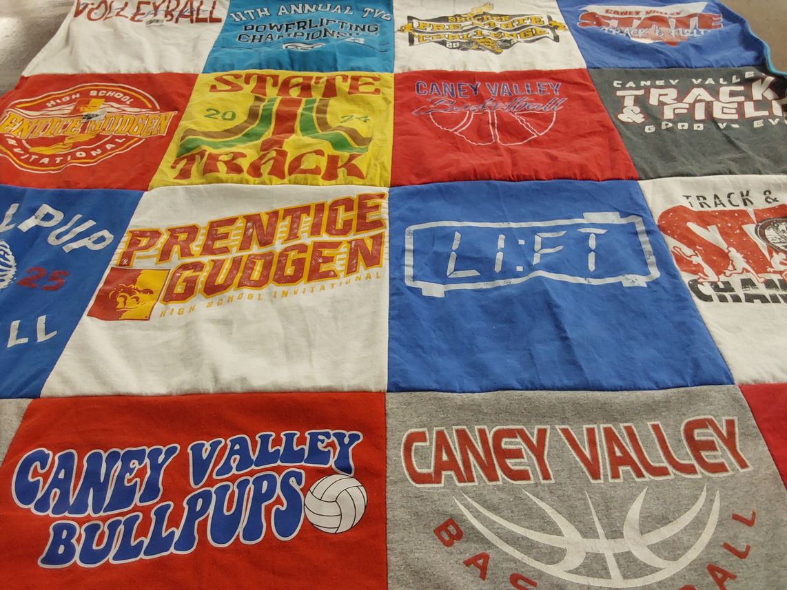 T-shirt quilt featuring caney valley bullpups basketball, caney valley track and field by Deborah from GA