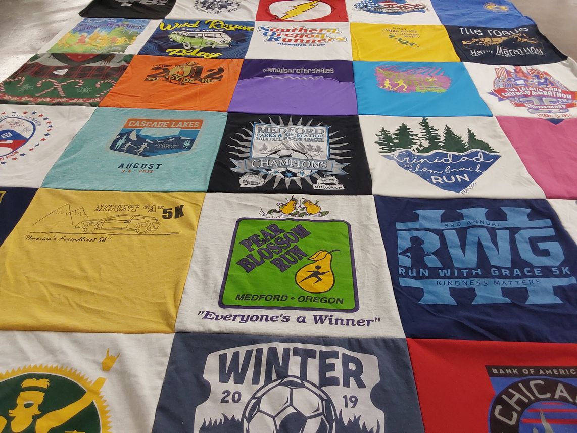 T-shirt quilt with running, marathons themes by Maggie from OR