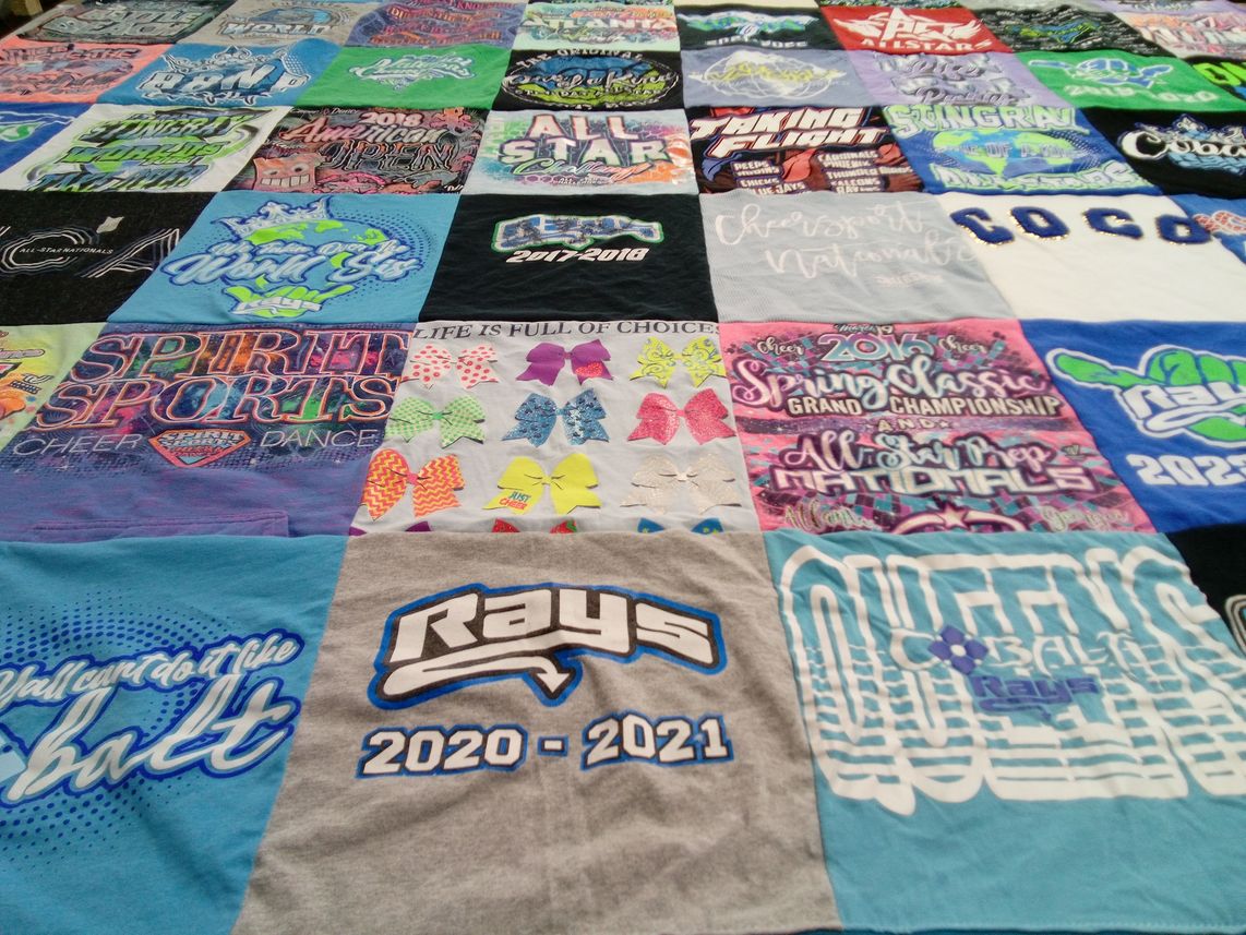 T-shirt quilt featuring rays by REBA from GA