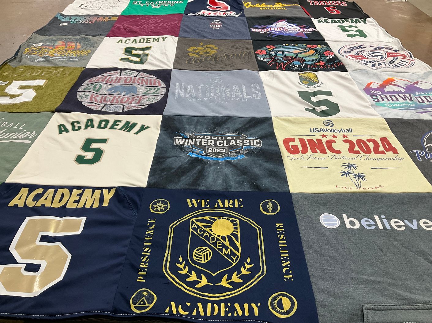 T-shirt quilt with sports, youth volleyball themes by Laura from CA
