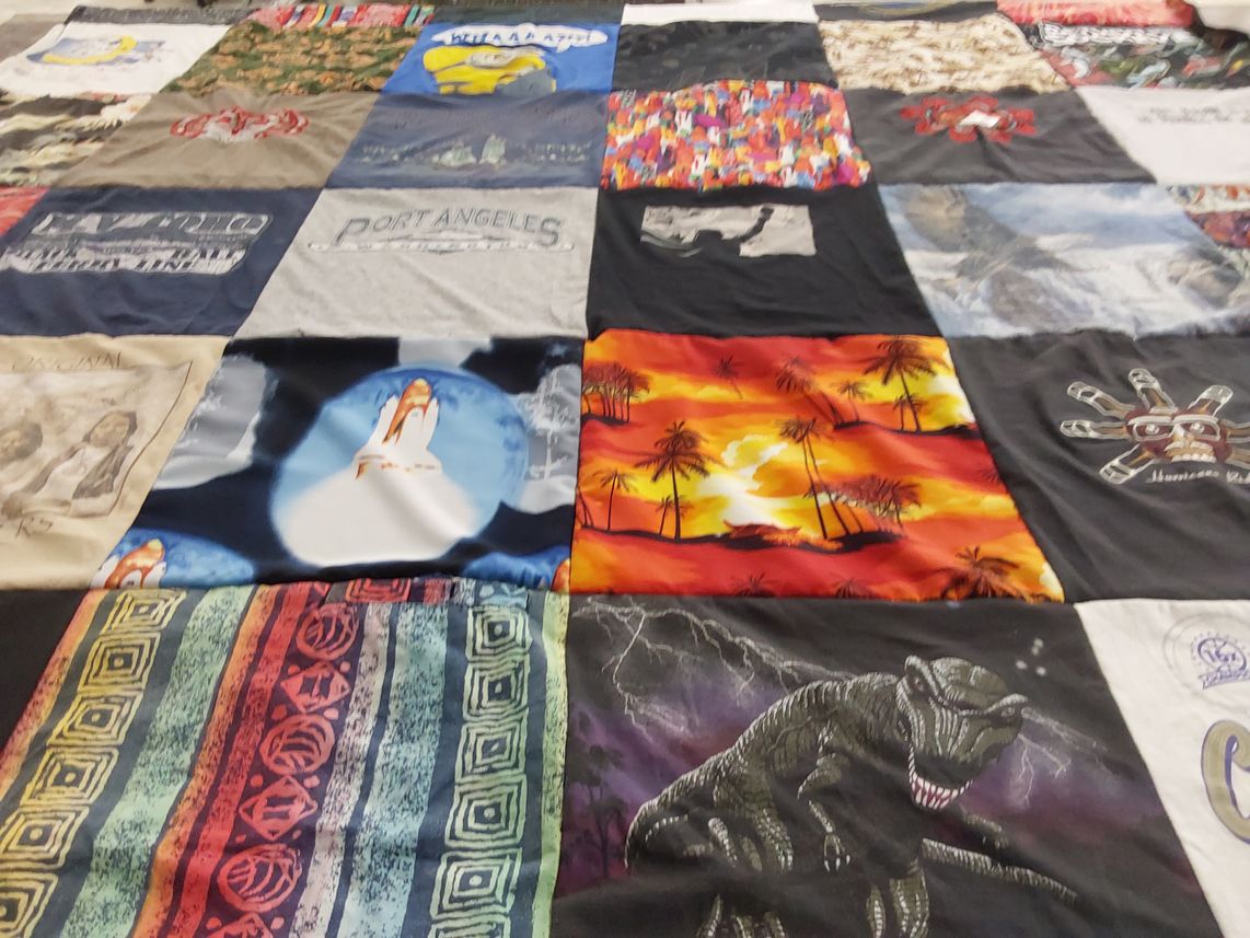 T-shirt quilt with nature, space themes by Pamela from CA