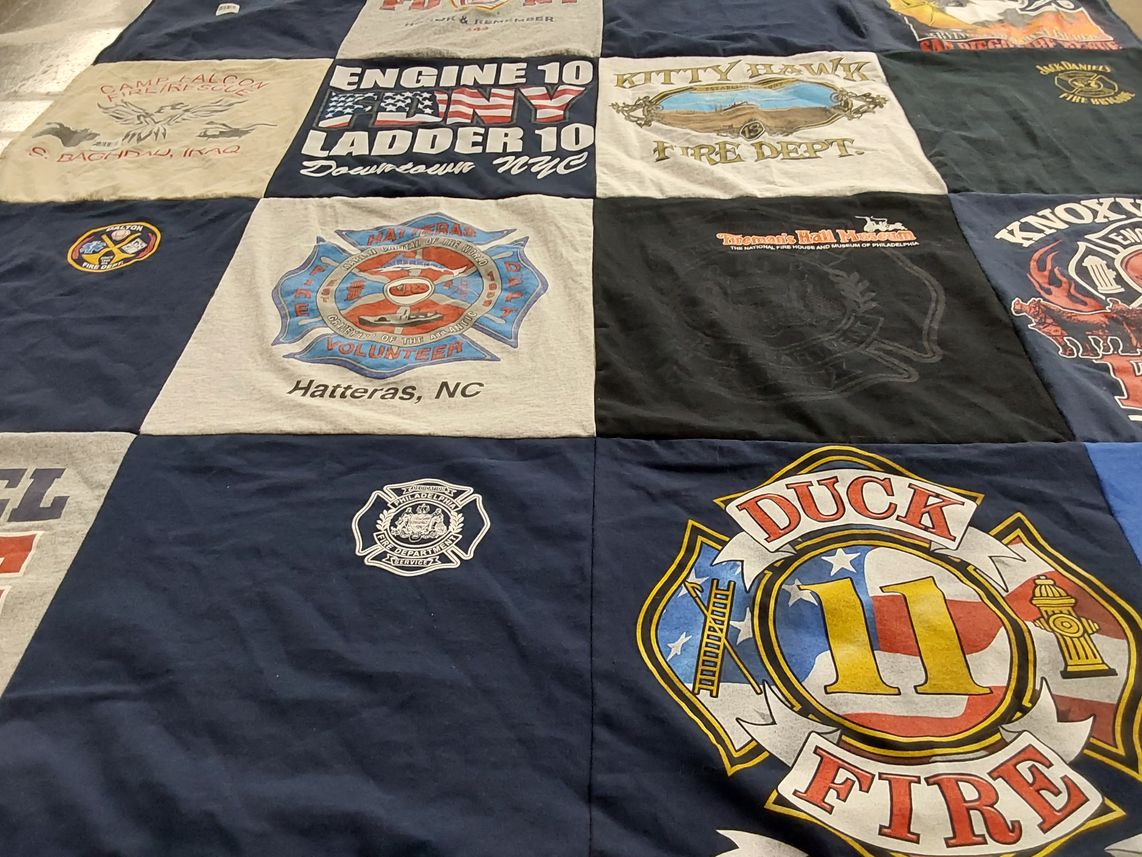 T-shirt quilt with firefighting, volunteerism themes by AMY from OH