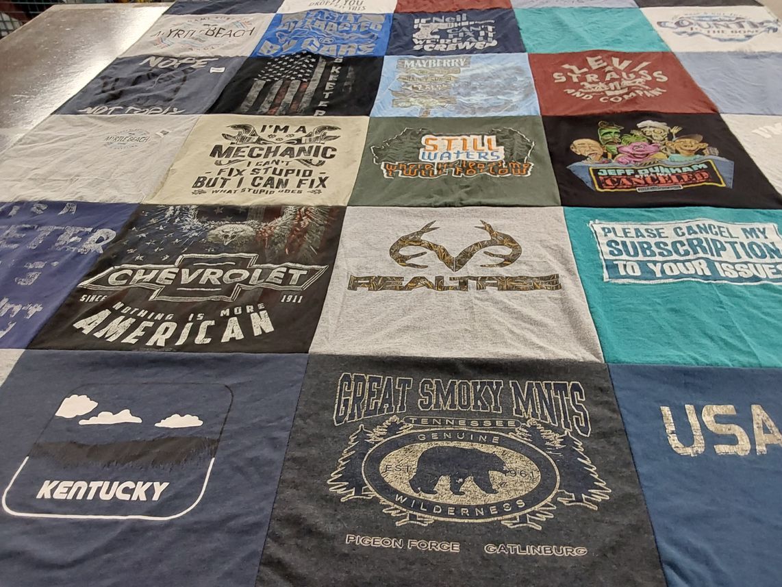 T-shirt quilt with travel, outdoors themes by Denise from KY