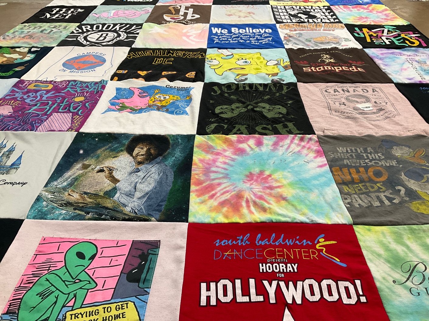 T-shirt quilt with art, music themes by Cynthia from AL